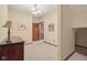 Neutral room with a lamp on a dresser and a view to an adjacent room at 965 W Main St, Greenwood, IN 46142