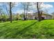 Beautifully landscaped yard surrounding this gorgeous home at 965 W Main St, Greenwood, IN 46142