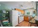 Bright kitchen with a ceiling fan, wood cabinets, and stainless steel appliances at 965 W Main St, Greenwood, IN 46142