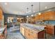 Open kitchen with a large island, offering generous counter space and a seamless flow to dining area at 965 W Main St, Greenwood, IN 46142
