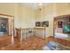 Bright upstairs landing with wood floors and beautiful trim work at 965 W Main St, Greenwood, IN 46142