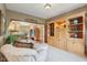 Cozy living room featuring built-in shelving at 965 W Main St, Greenwood, IN 46142
