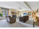 Spacious living room featuring plush seating, a fireplace, and abundant natural light at 965 W Main St, Greenwood, IN 46142