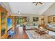 Open-concept living room showcasing hardwood floors and relaxed seating at 965 W Main St, Greenwood, IN 46142