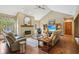 Inviting living room boasts a vaulted ceiling, fireplace, and hardwood floors at 965 W Main St, Greenwood, IN 46142