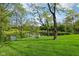 Picturesque pond offering a serene natural setting for this lovely property at 965 W Main St, Greenwood, IN 46142