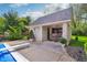 View of the pool house with a bar and seating and a pool in front at 965 W Main St, Greenwood, IN 46142