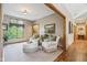 Bright sitting room with large window and hardwood trim at 965 W Main St, Greenwood, IN 46142