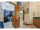 Spacious walk-in closet and bathroom with a large dressing area and plentiful storage at 965 W Main St, Greenwood, IN 46142