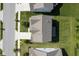 Aerial view of a well-manicured lawn and asphalt shingle roof, showcasing the home's location on a quiet street at 9822 Tampico Chase, Fishers, IN 46040