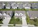 Aerial view of a neighborhood showcasing well-maintained homes with lawns at 9822 Tampico Chase, Fishers, IN 46040