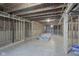 Unfinished basement with stud framing and exposed ceiling; ready to be finished at 9822 Tampico Chase, Fishers, IN 46040