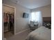 Bedroom featuring natural light, a desk area and built-in closet storage at 9822 Tampico Chase, Fishers, IN 46040