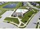 Overhead shot of a pristine clubhouse, pool and surrounding community at 9822 Tampico Chase, Fishers, IN 46040