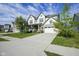Charming two-story home with well-maintained lawn and an attached two-car garage at 9822 Tampico Chase, Fishers, IN 46040