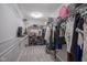 A walk-in closet with shelving and hanging space for clothing and accessories at 9822 Tampico Chase, Fishers, IN 46040