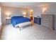 Main bedroom features soft carpet, natural light, and is adjacent to the main bath at 10316 Hatherley Way, Fishers, IN 46037