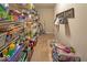 Walk-in pantry with metal racks that provide an abundance of storage space at 10316 Hatherley Way, Fishers, IN 46037
