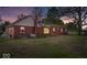 The rear exterior is brick with a green lawn and visible windows at 10473 N County Road 950 E, Brownsburg, IN 46112
