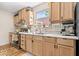 Updated kitchen showcasing bright cabinets and stainless steel appliances at 10473 N County Road 950 E, Brownsburg, IN 46112
