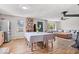 Open-concept kitchen flows into a cozy living room with ample seating and natural light at 10473 N County Road 950 E, Brownsburg, IN 46112