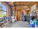 Shed features a workbench, pegboard, toolbox, and racks for outdoor gear at 10473 N County Road 950 E, Brownsburg, IN 46112