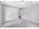 Comfortable bedroom features neutral carpet and a closet with double doors at 10602 Fall Rd, Fishers, IN 46037