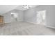 Spacious bonus room featuring neutral carpet, and access to other rooms at 10602 Fall Rd, Fishers, IN 46037