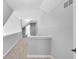 This hallway features neutral carpet and white walls with a view to the outside at 10602 Fall Rd, Fishers, IN 46037