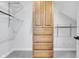 Walk-in closet featuring custom shelving and storage solutions at 10602 Fall Rd, Fishers, IN 46037