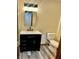 Modern bathroom featuring a black vanity, sleek faucet, and updated toilet at 1081 Torino Ln, Franklin, IN 46131