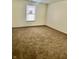 Bedroom featuring carpet, window with blinds, and neutral walls, creating a serene and inviting space at 1081 Torino Ln, Franklin, IN 46131