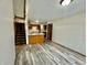 Cozy living area with staircase, open floor plan and access to the kitchen at 1081 Torino Ln, Franklin, IN 46131