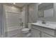 This bathroom features a shower-tub combo, white vanity and mirror at 1115 Senate Dr, Edinburgh, IN 46124