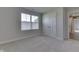 Bedroom features neutral walls, carpeted floors, a window and closet at 1115 Senate Dr, Edinburgh, IN 46124