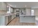 Well-equipped kitchen with stainless appliances, granite counters, and center island at 1115 Senate Dr, Edinburgh, IN 46124