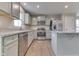 Well-equipped kitchen showcases stainless steel appliances, granite counters and a functional layout at 1115 Senate Dr, Edinburgh, IN 46124