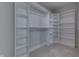 Spacious walk-in closet with custom shelving and ample storage space at 1115 Senate Dr, Edinburgh, IN 46124