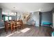Open-concept dining room with hardwood floors and easy access to other living areas at 1257 Rosemary Ct, Greenfield, IN 46140