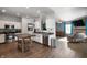 Open kitchen with stainless steel appliances, white cabinets, and an island with a wood top at 1257 Rosemary Ct, Greenfield, IN 46140