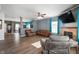 Spacious living room with hardwood floors, a fireplace, and plenty of natural light at 1257 Rosemary Ct, Greenfield, IN 46140