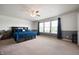 Spacious main bedroom features a ceiling fan and plenty of natural light at 1257 Rosemary Ct, Greenfield, IN 46140