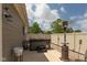Cozy backyard patio with a hot tub, privacy fence, and an outdoor heater, perfect for relaxation at 1274 Old Heritage Pl, Greenwood, IN 46143