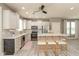Modern kitchen features an island with seating and stainless steel appliances at 1274 Old Heritage Pl, Greenwood, IN 46143