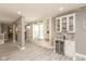 Open concept living area with built in shelving and refreshment center at 1274 Old Heritage Pl, Greenwood, IN 46143