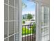 A lovely view from the balcony showing a well-kept neighborhood and a bright blue sky at 12833 Tradd St # 1B, Carmel, IN 46032
