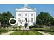 Elegant community clubhouse with manicured grounds and stately architecture at 12833 Tradd St # 1B, Carmel, IN 46032