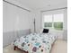 Bright bedroom with natural light, modern decor, and view of backyard at 12990 Moultrie St, Carmel, IN 46032