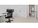 Bright office space with large monitor and closet with double doors at 12990 Moultrie St, Carmel, IN 46032