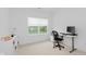 Bright home office with large window overlooking green space at 12990 Moultrie St, Carmel, IN 46032